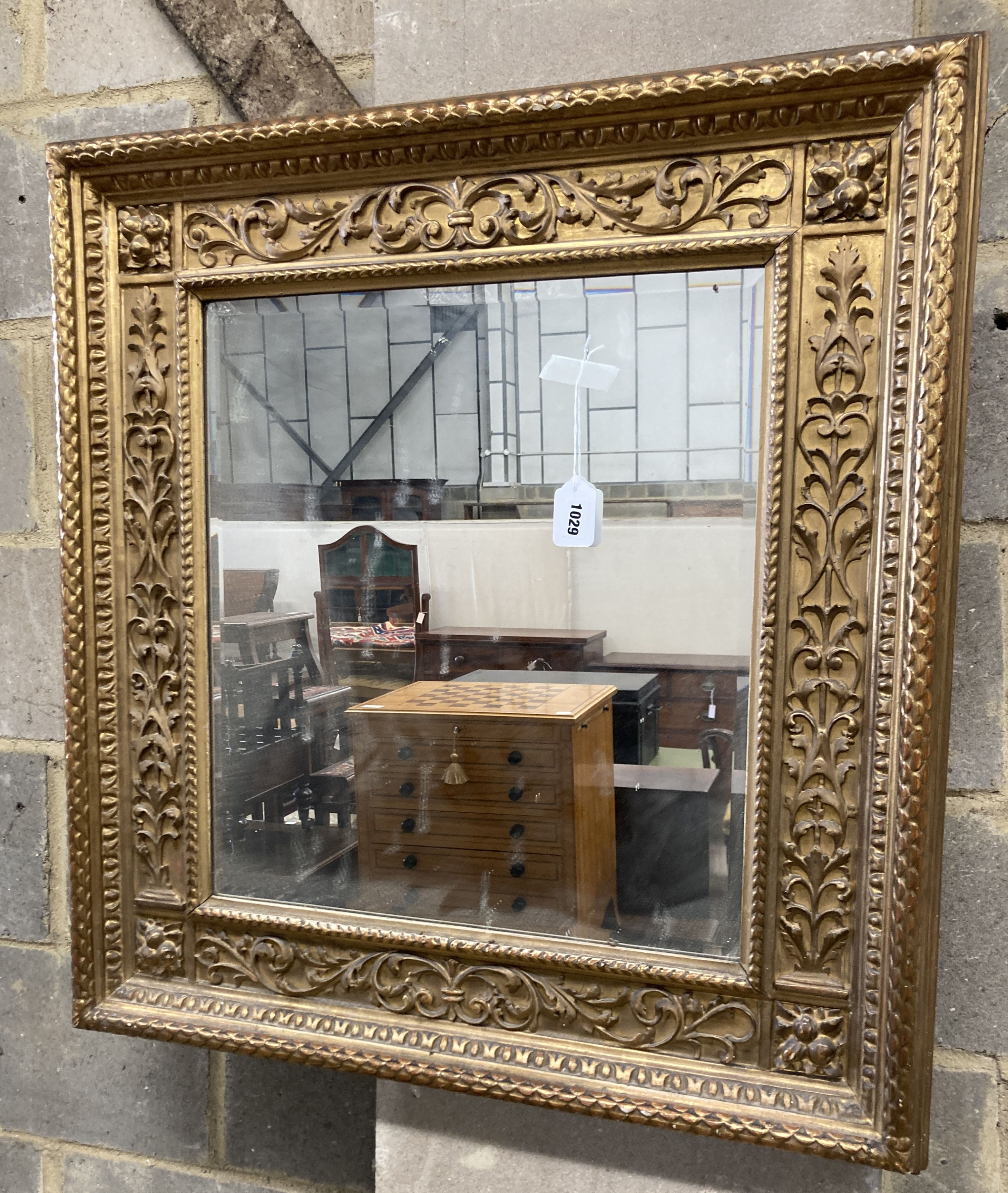A 19th century rectangular giltwood and gesso wall mirror, width 75cm, height 80cm